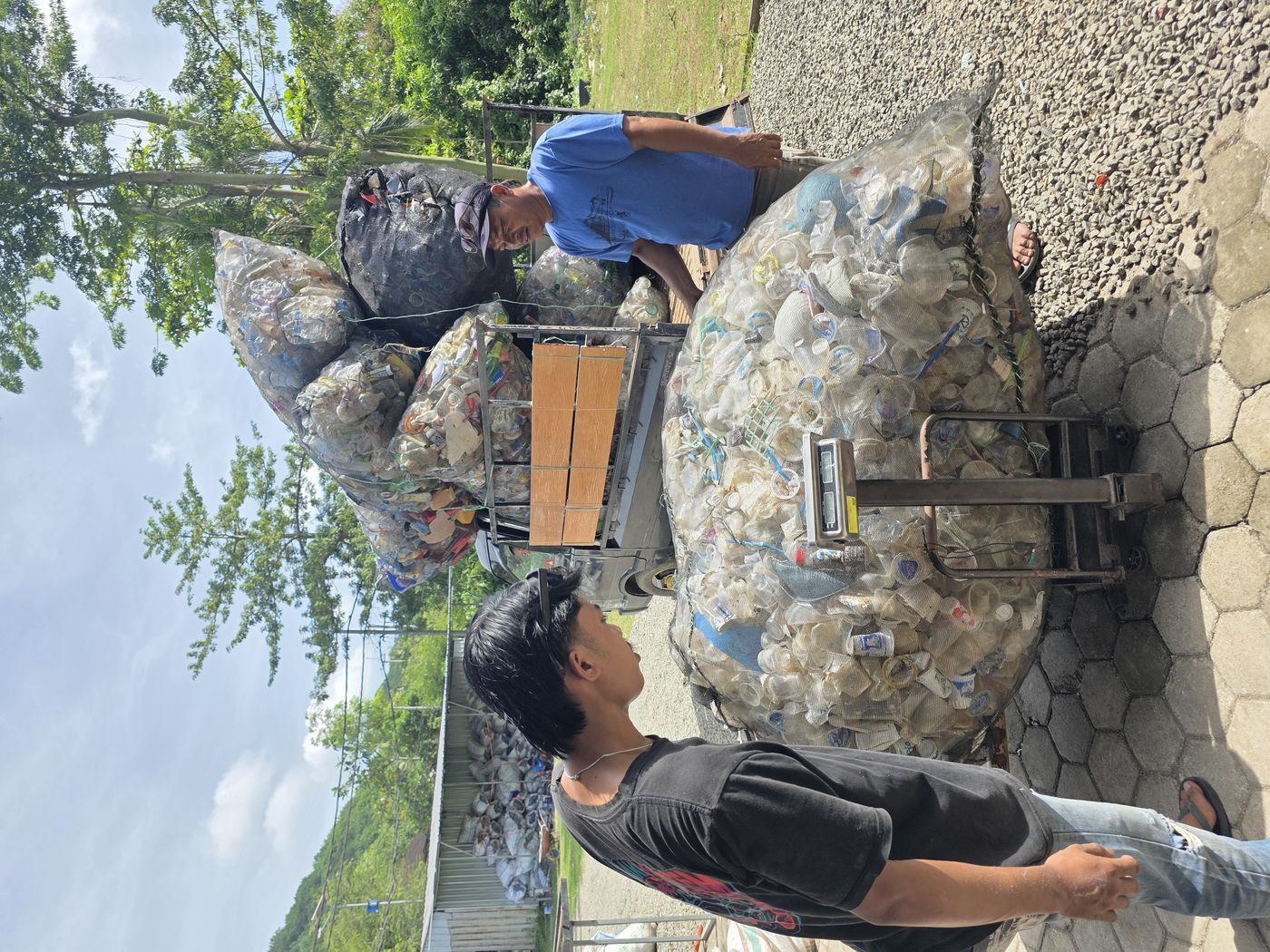 Weighing collected plastic at the Kuta hub