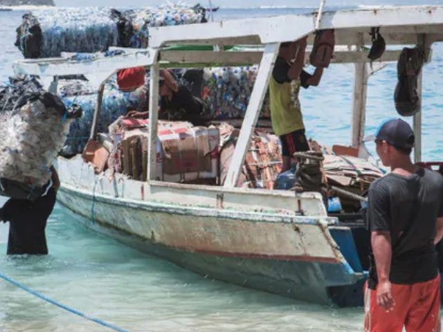 Boat loaded with baled ocean-bound plastic, Lombok