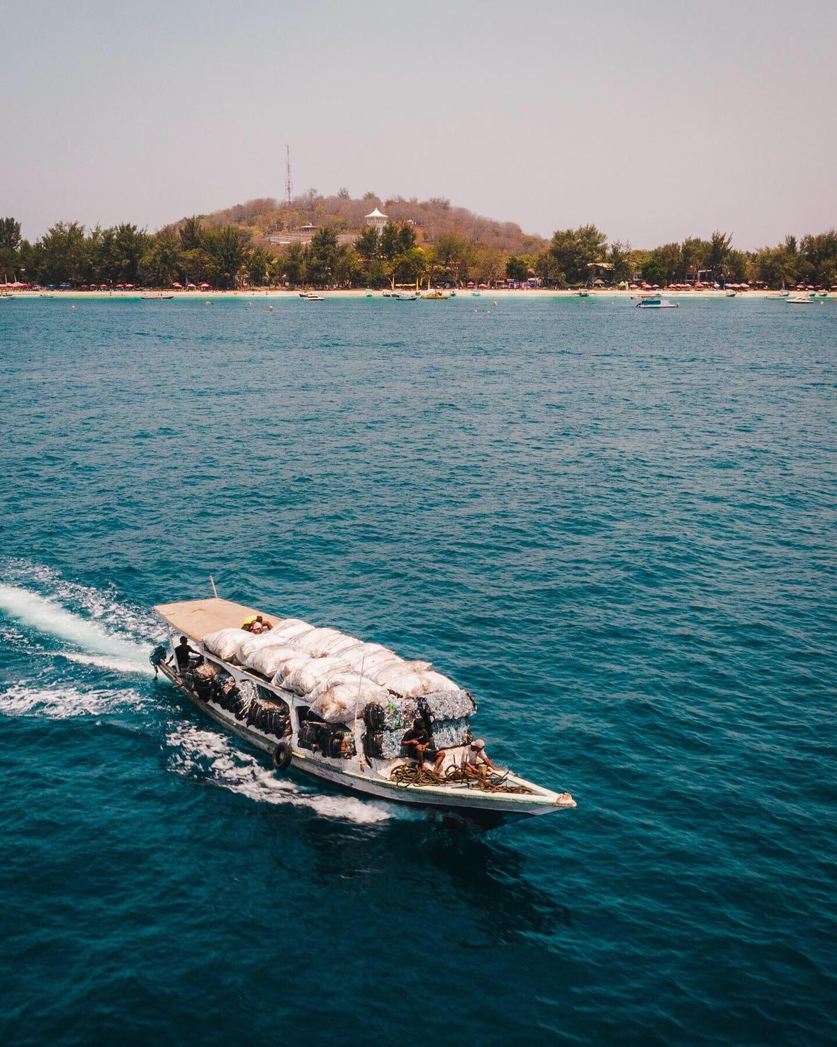 Collection boat carrying baled plastic from the Gili Islands, Lombok