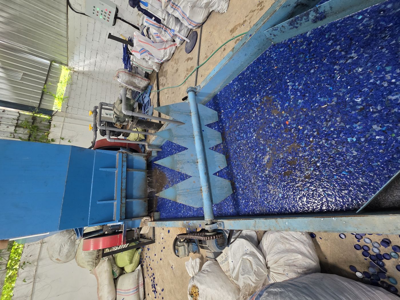 HDPE flakes through the wash line